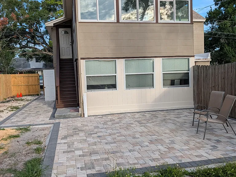 Patio deck and walkway which spans the entire yard just installed!