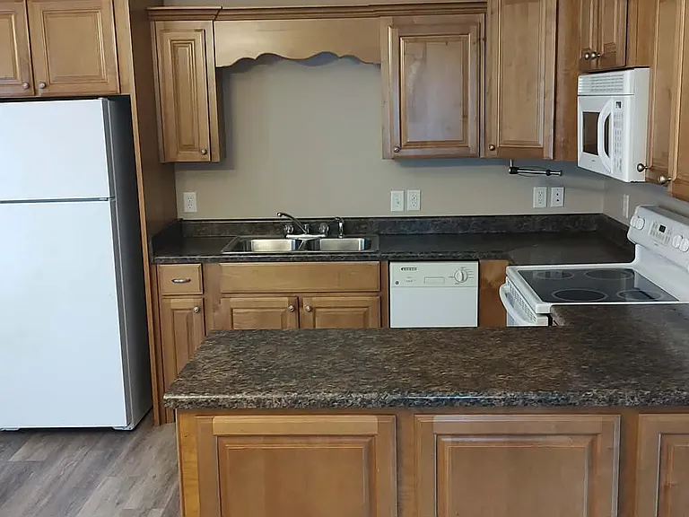 Kitchen - Custom Built cabinets, refrigerator, range, microwave, dishwasher, spacious pantry