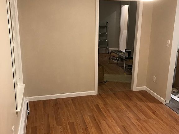 Formal dining room leading into living room or kitchen