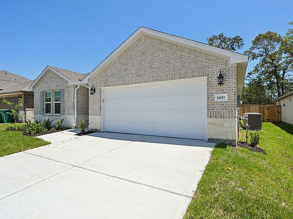 The Henderson floorplan in Stewart s Ranch of Conroe, TX.