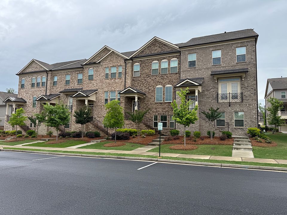 Front View of the building with guest parking spaces