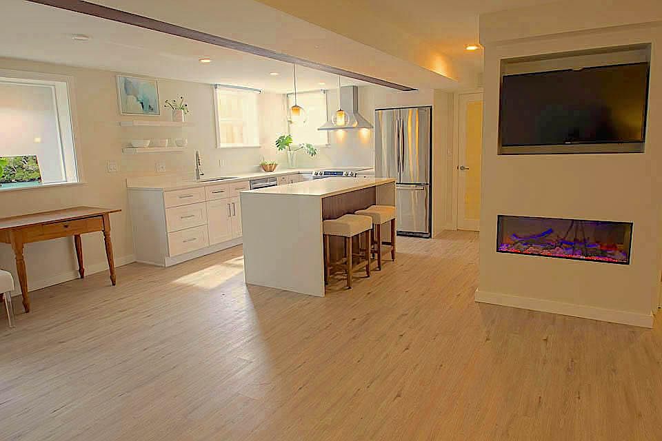 _Beautiful Open Floor plan. _Quartz Waterfall Counters _Modern Fireplace. _Double door Refrigerator. _Built in T.V. Alcove _Walnut Counter Back