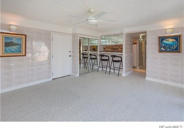 Open flowing living room and dining bar for entertaining.