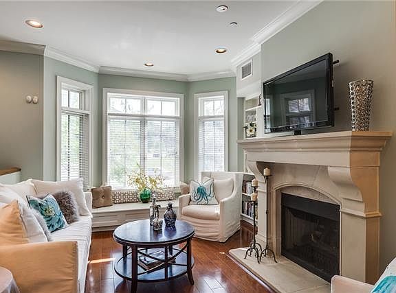 Cozy living room with ecquisite fireplace!
