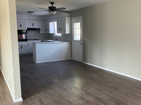 Kitchen, all new paint, lighting, new stainless steel sink, faucet & vent hood