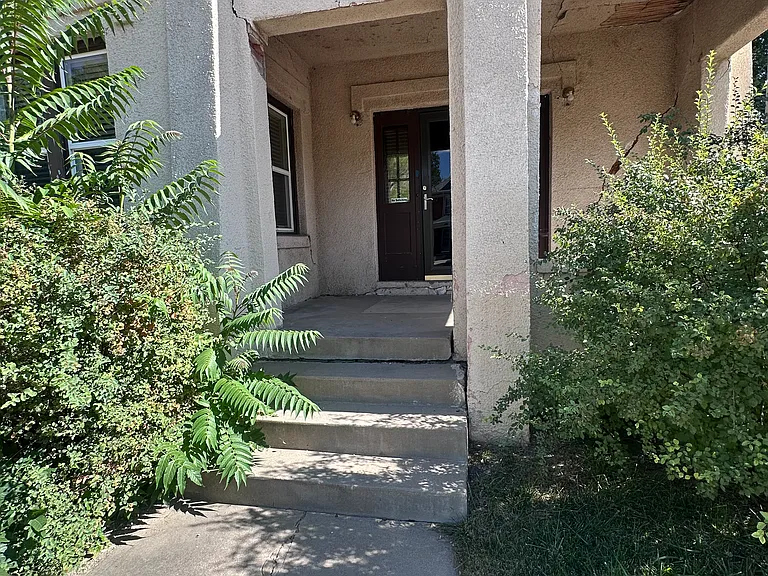 Walking up to front door