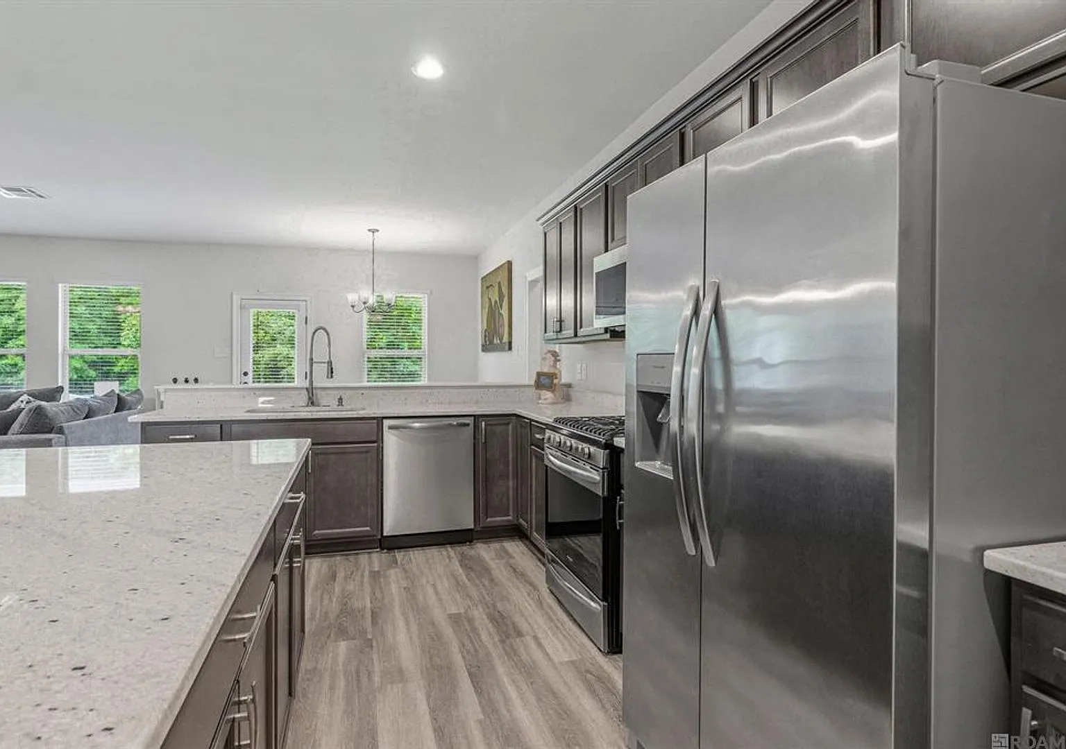 Modern 3 Bedroom Home with Private Backyard Views in Forestwood — Photo 4