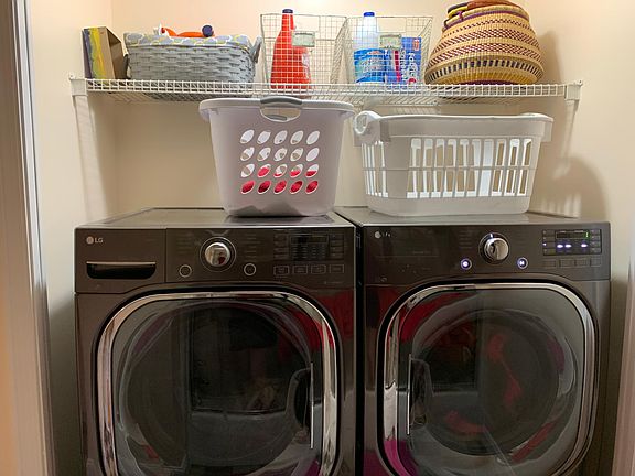 New LG washer / dryer with steam clean function and side kick mini washer underneath. Purchased 2018.