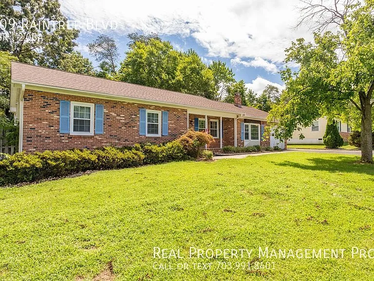 209 Raintree Blvd — Photo 3