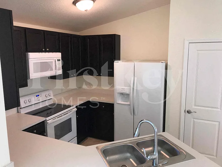 1731 NW 14th St — Photo 12