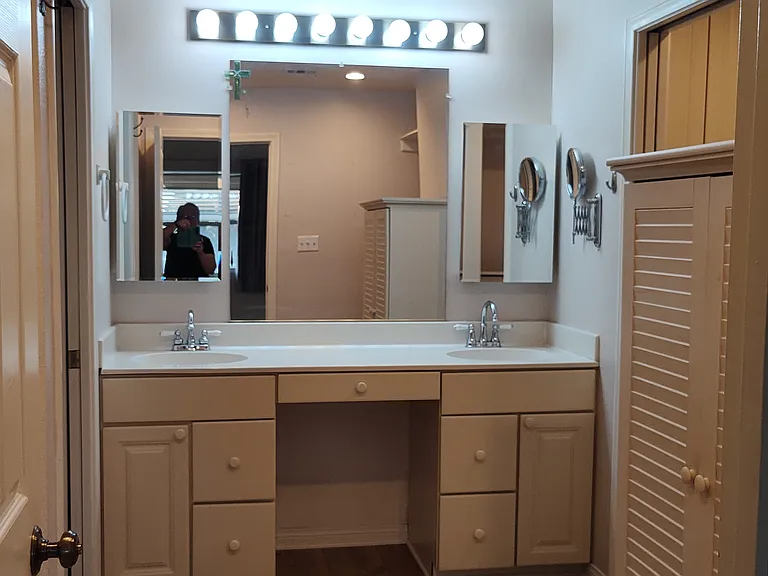 master bathroom, attached closet and laundry