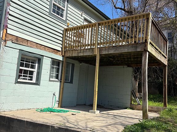 view of the home from the back with deck