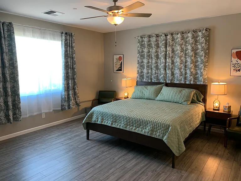 Lots of light in the Master Bedroom. A King size bed with a lightly used high quality mattress.
