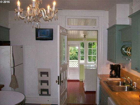 Kitchen Looking towards pantry and patio