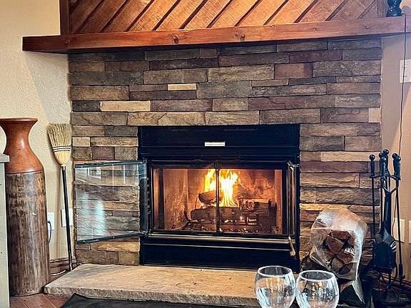 Close up of wood burning fireplace.