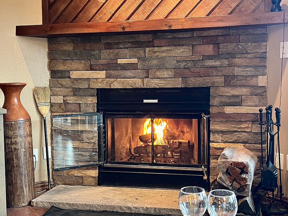 Close up of wood burning fireplace.