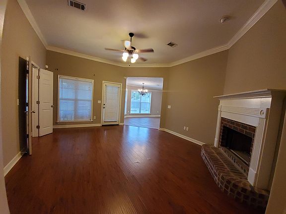 Front door entrance you enter family room, left to hallway to 2 bedrooms, straight ahead, door to back yard. Then there is the entrance into the Kitchen with lots of windows (blinds).