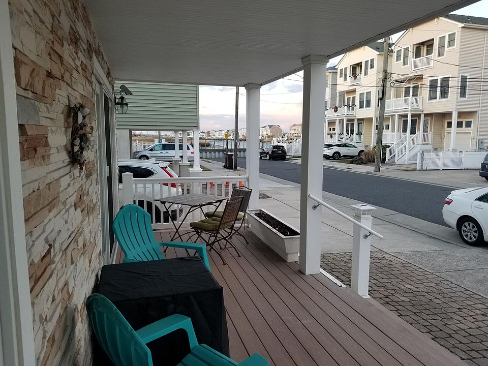Porch view. This home is a few houses from the bay.