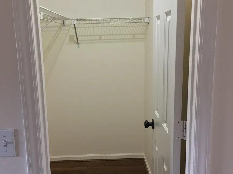 One of TWO walk in closets in the Master Bedroom
