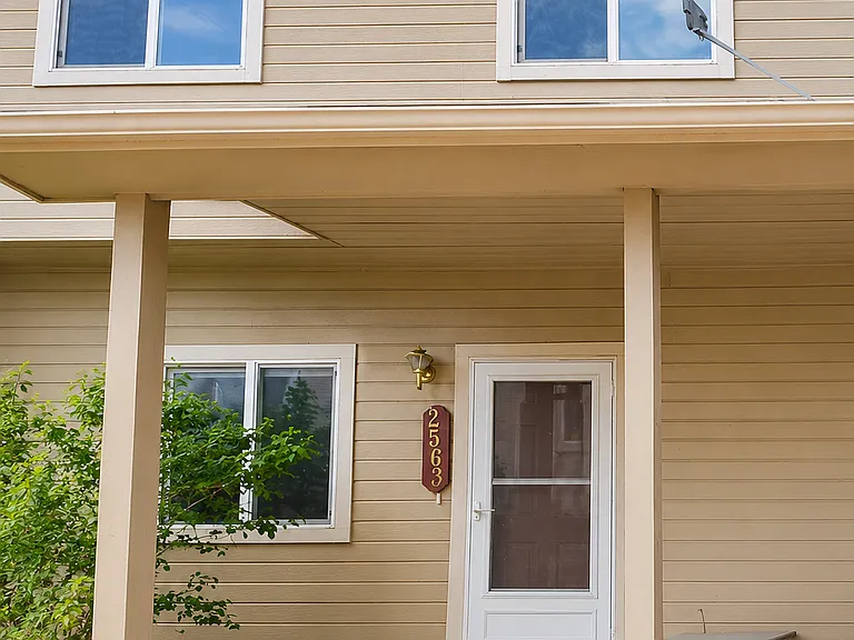 Front exterior entry and covered porch