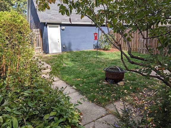 Fenced back yard and garage