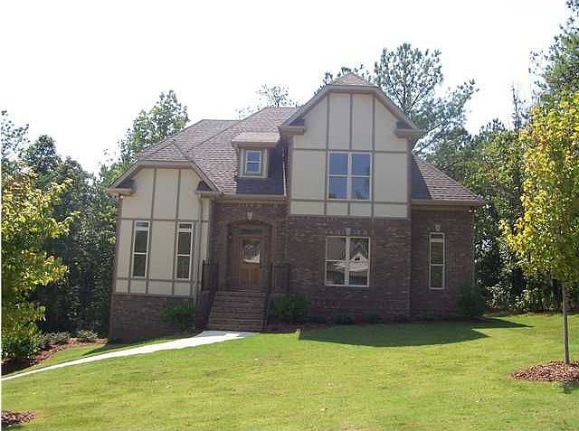 GORGEOUS BRICK AND TUTOR HOME