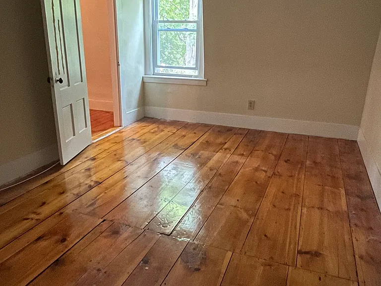 Rear bedroom (note: no overhead light, floor lamps needed)