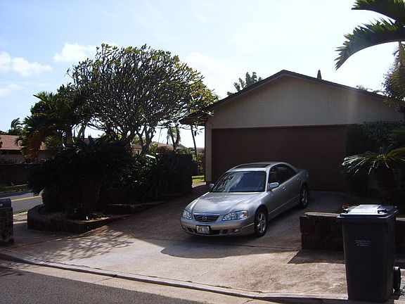 Front drive with large 2-car garage and storage