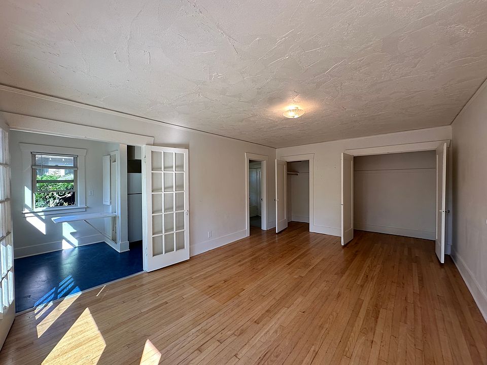 view of living space with closet doors open