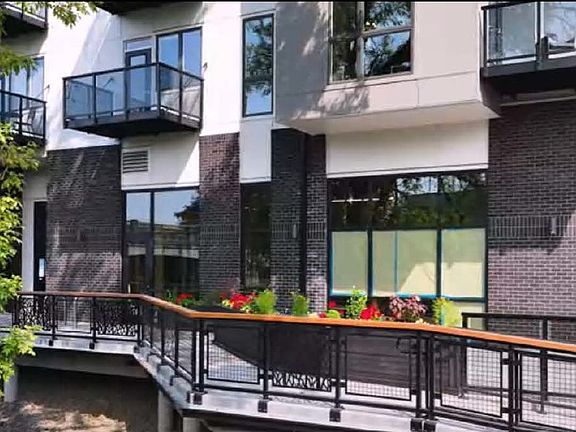 Buillding 's frontage Plaza facing Fanno Creek