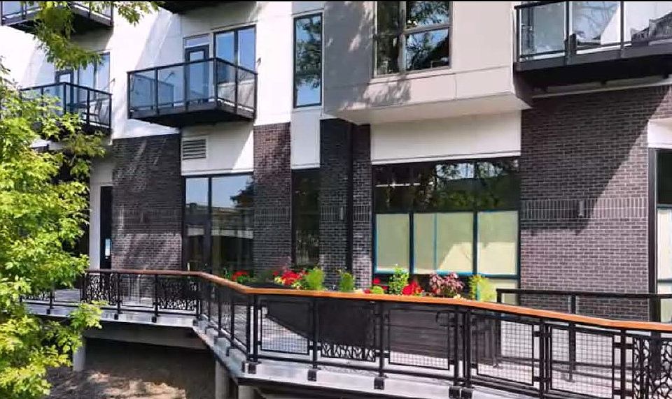 Buillding 's frontage Plaza facing Fanno Creek