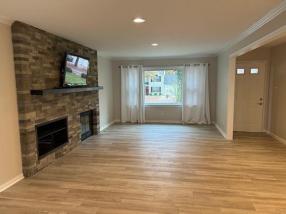 Gas fireplace, light filled living room