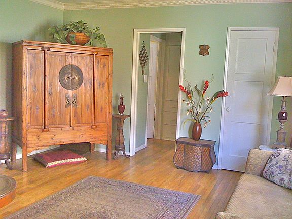 Large flatscreen TV in Chinese armoire.