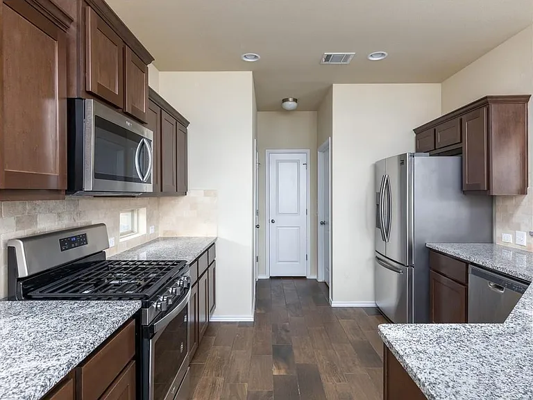Pantry in the back of the kitchen