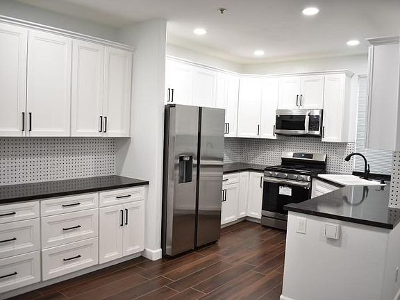 Remodeled kitchen with All New Appliances Sink and Fixtures