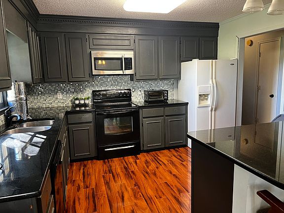 Kitchen with granite countertops