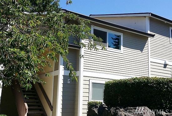 Welcome to Newcourt Condominiums! Entry photo of home, close to freeways, shopping, and future light rail station.