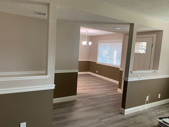 View of the front entry and dining area as seen from the living room
