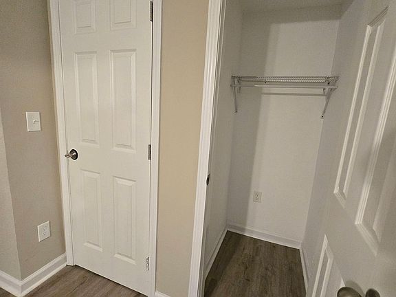 Closet and a dresser offer plenty of room for your belongings