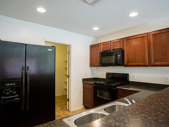 5th image of 7028 S Red Maids Dr