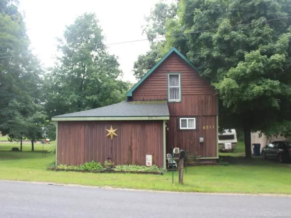 6511 3rd St, Holton, MI 49425