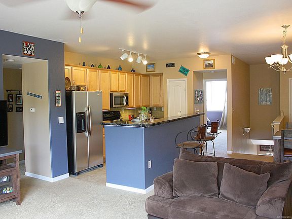 5th image of 10128 W 55th Dr Unit 203