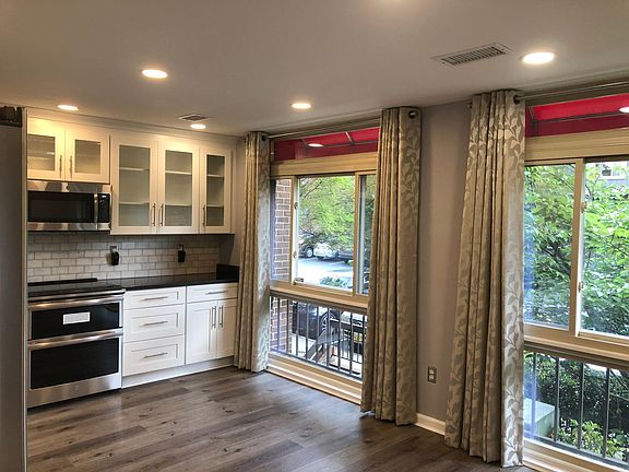 Large kitchen and dining area on the first floor of unit
