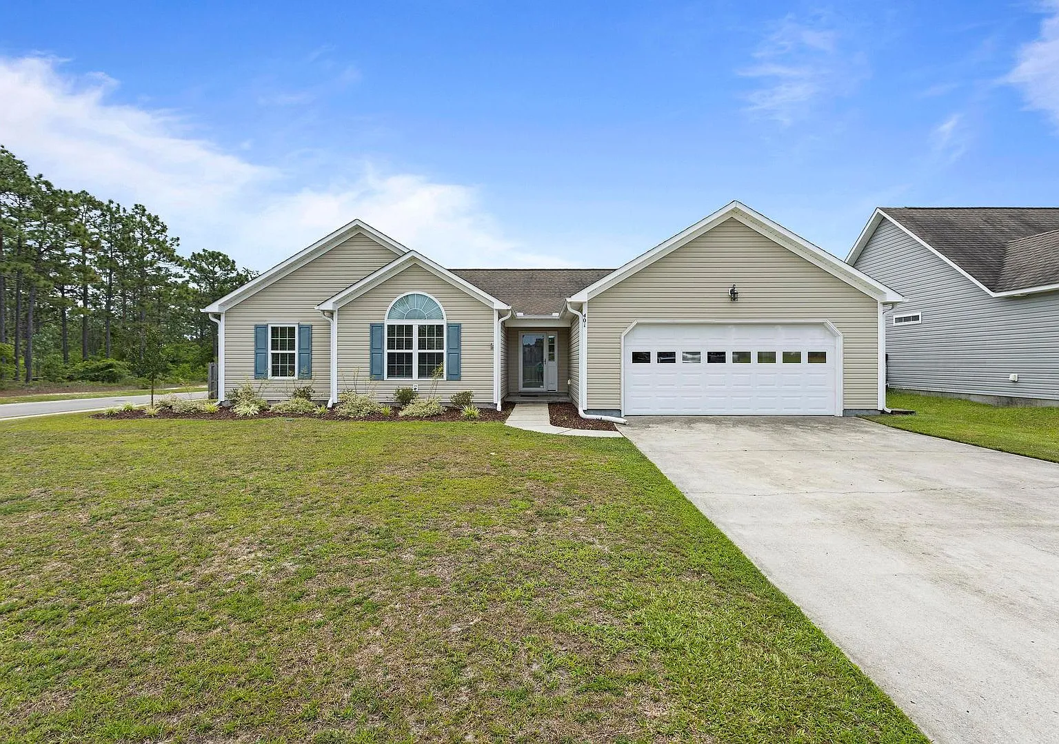 Corner House with Fenced Back Yard Available! — Photo 1