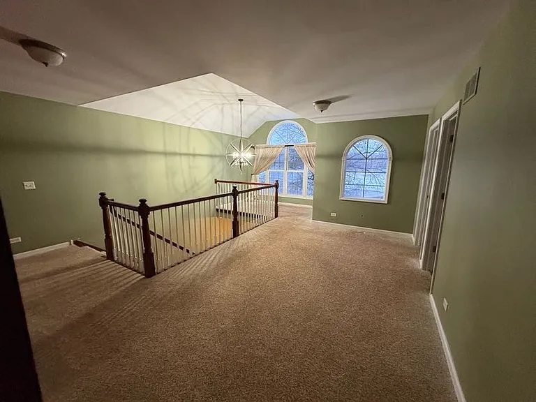 Room for a couch in the loft area with separate working area