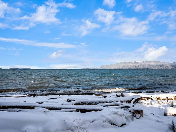 A breathtaking day, with snowcapped Mountain and Island views.