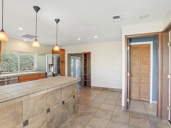 ...stainless steel appliances, bright and spacious