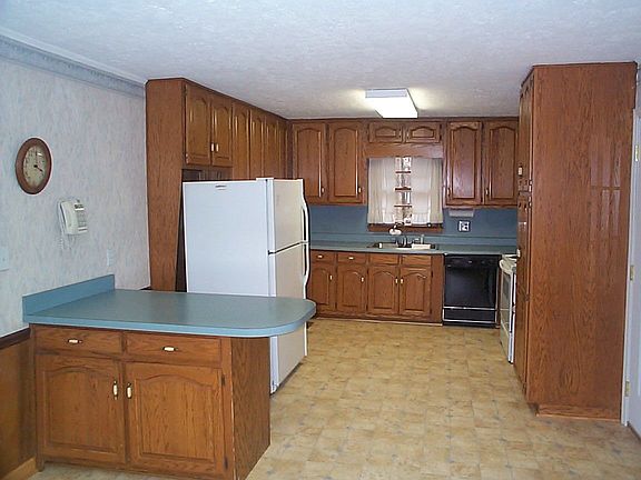 LARGE UPDATED KITCHEN WITH VIEW TO FAMILY ROOM