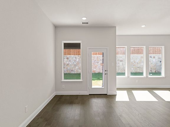 San Martino II floor plan featuring open-concept main-level living, a private study, covered patio,