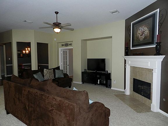Den is open to the breakfast room,sun room,kitchen and